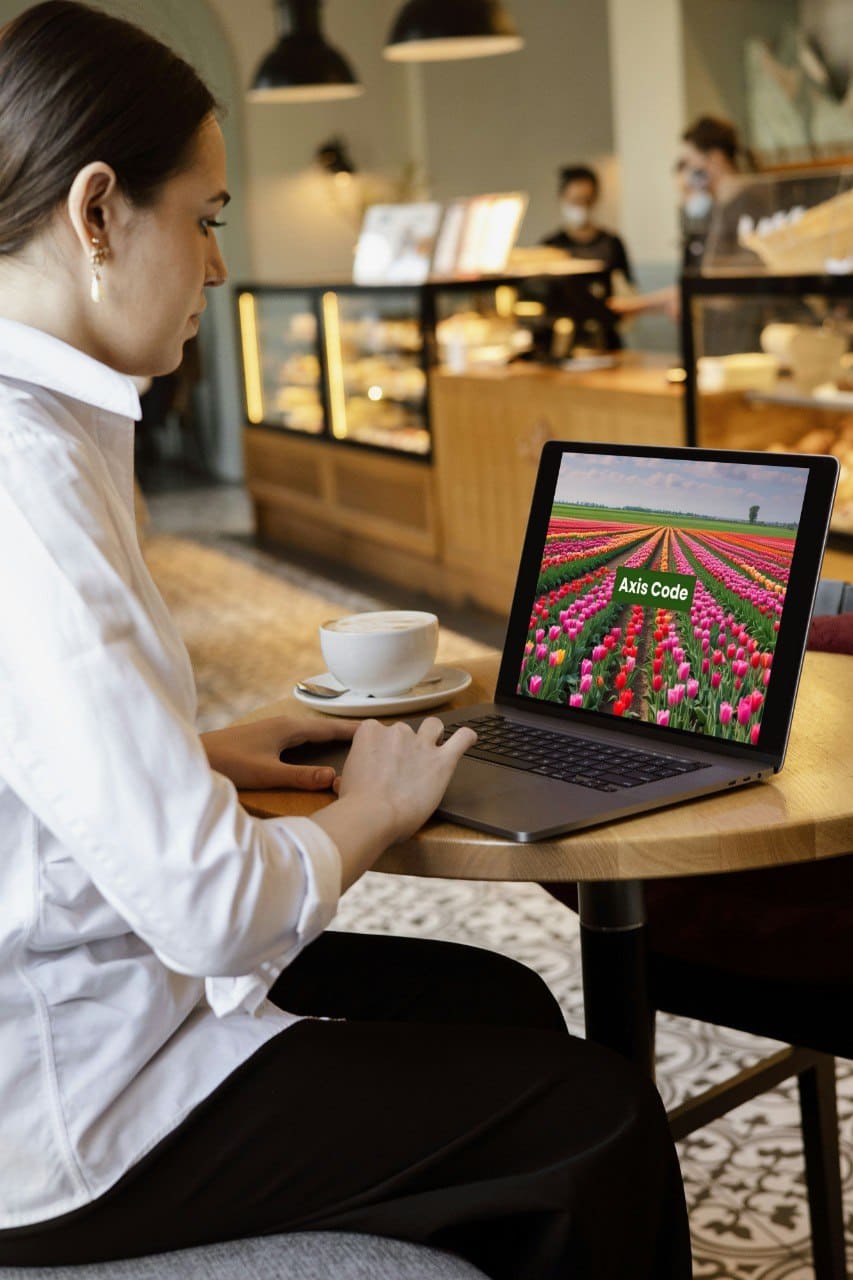 Women use laptop to lear C++ course 'Axis Code'